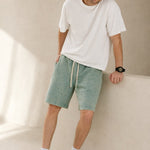 Sakura Summer Shorts — Grass, studio product shot