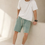 Sakura Summer Shorts — Grass, studio product shot